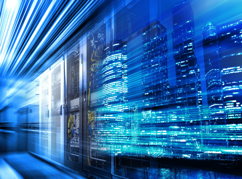 A dynamic blend of a server room and a cityscape at night, with bright blue and white light streaks suggesting high-speed data flow and connectivity. The image symbolizes technology, urban advancement, and innovative Business Internet Solutions.