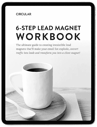 Tablet displaying a cover titled 6-Step Lead Magnet Workbook with a white mug of coffee on a wooden surface. The subtitle reads: The ultimate guide to creating irresistible lead magnets that’ll make your email list explode, convert traffic into leads and transform you into a client magnet!.